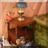 F122. Tiered side table with drawers.